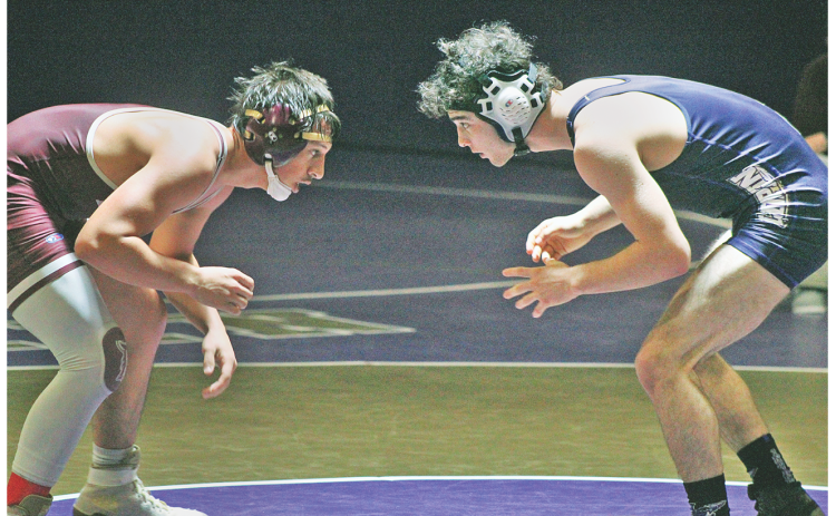 Wrestler TJ Payne takes on his Dawson County opponent during Lumpkin’s home meet last week.