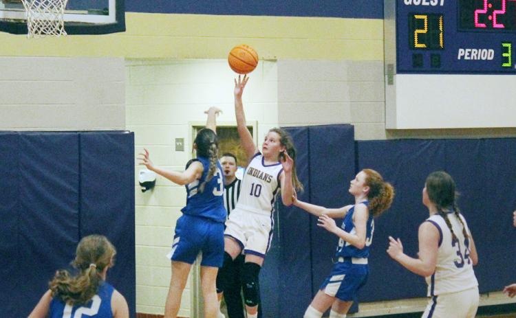 Lumpkin eighth grader Emmie Reese goes up for a basket against the Fannin defense in last week’s game.