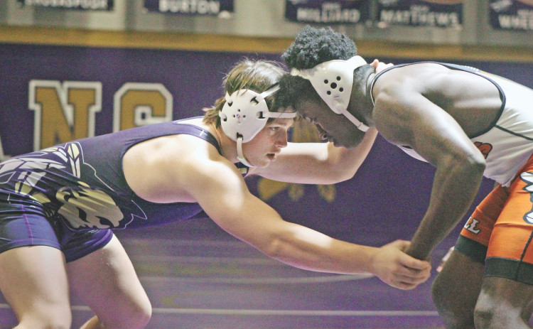 Lumpkin’s Mike Nichols takes on an opponent at the Tribe House.  Nichols was able to pin his talented opponent from White County during the Area Duals last week.
