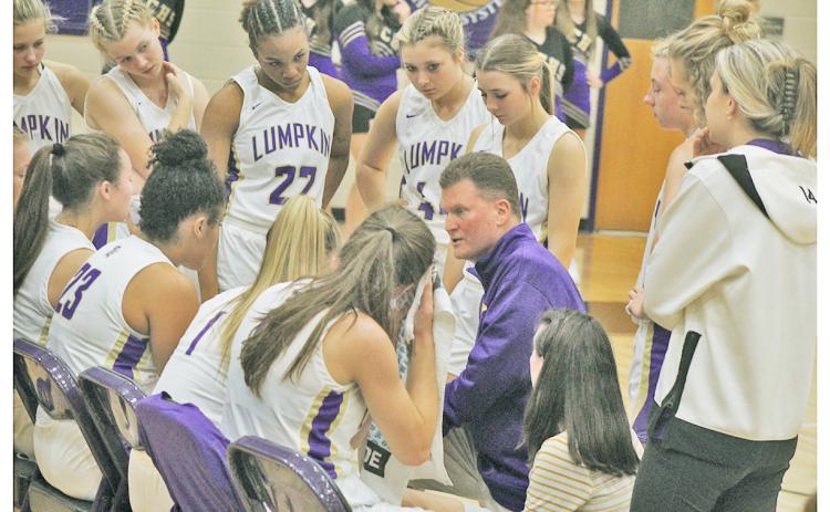 LCHS girls basketball head coach David Dowse talks strategy during a timeout in last week’s home game.