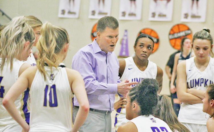 Lumpkin County girls basketball head coach David Dowse speaks to his team during a timeout in last week’s Senior Night game.  Lumpkin is competing in the Region Tournament this week.