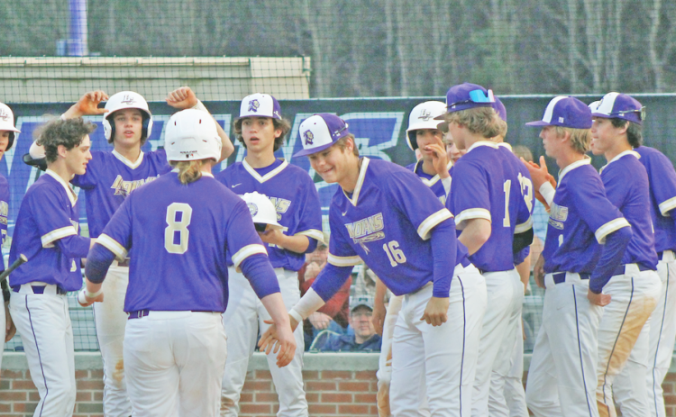 The Lumpkin County High School baseball team celebrates Cooper Scott’s homer against West Hall last week.
