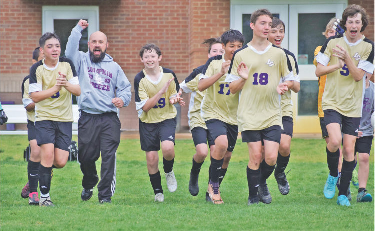 The Lumpkin County Middle School boys soccer team claimed the Mountain League Championship trophy after defeating Dawson in the finals last week.