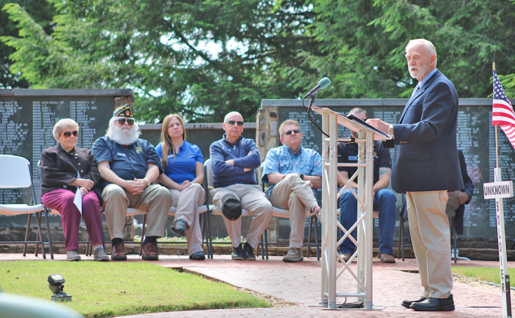 Vietnam veteran Paul Hanson addresses the crowd at Veterans Park during the annual Memorial Day ceremony on May 27. Hanson has played a leading role in the biannual effort to place Memorial Flag Markers along Dahlonega’s roadsides.