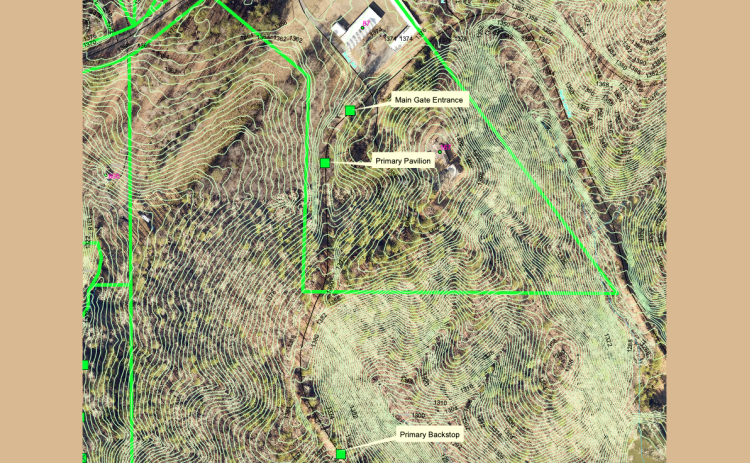 On a map of the proposed Blackburn Park rifle range presented to the Board of Commissioners, the roof of Fire Station #8 is visible to the north. Shop Road passes by that building and connects with Dam Road, where the range would be located.