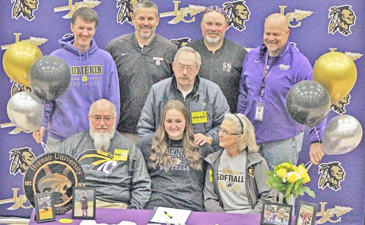 Lumpkin County senior Natalie Shubert celebrates her college signing along with her family and coaches.