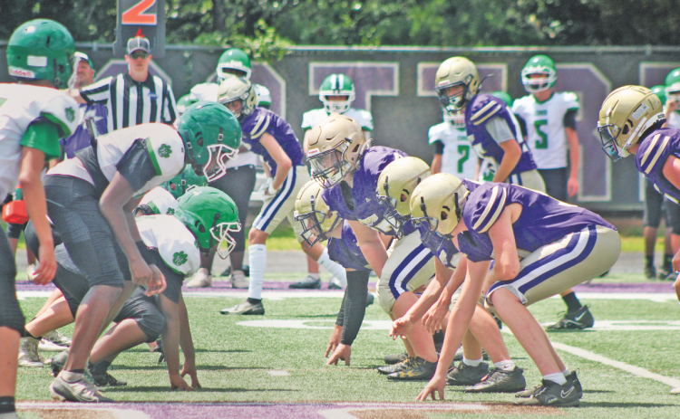 The Lumpkin County Middle School offensive line squares off with Franklin’s defense during last week’s scrimmage game.