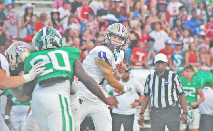Lumpkin quarterback Cal Faulkner delivers a pass in last week’s 47-7 victory for the Indians over Franklin County.