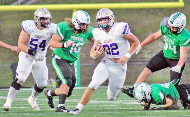 Lumpkin running back Mason Sullens powers through the Dragons’ defensive line. (Photo curtesy of Carrie Roy)