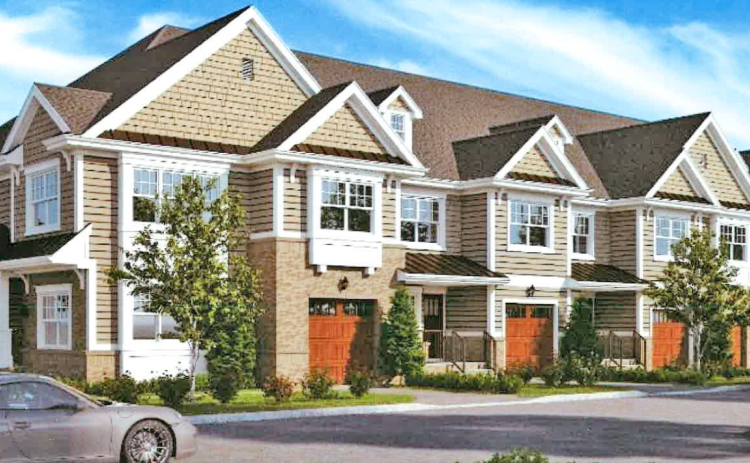 An artist rendering provided by Mountain Top Real Estate Group, LLC depicts proposed townhome units that feature a mountain architectural design as called for by the City’s Comprehensive Plan.
