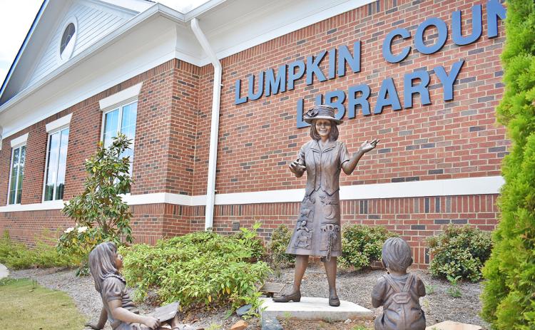 Sculptures promoting children’s literacy decorate the entrance to the Lumpkin County Library. Lumpkin Literacy plans to host a “Family Read In” event at the library on March 7, 2024.