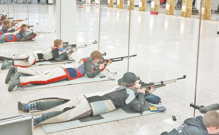 The Lumpkin County High School rifle team scopes out their targets during last week’s meet.