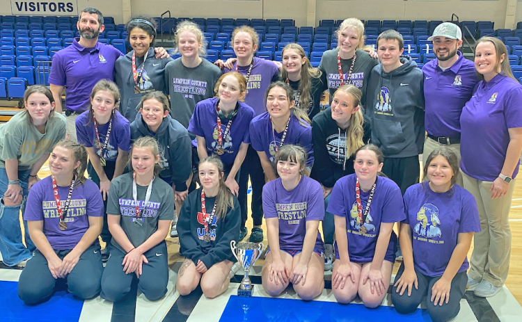 The Lady Indians Wrestling team won their their Traditional Area Championship as a first year program.