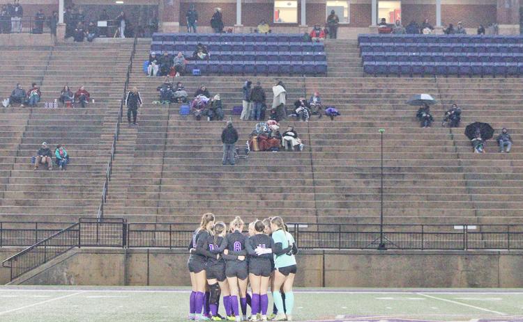 The Lumpkin County High School Indians huddle up before their game.